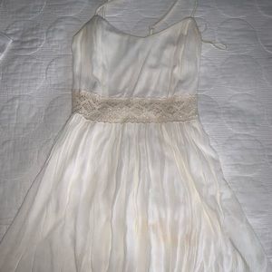 Short white crisscross strap dress